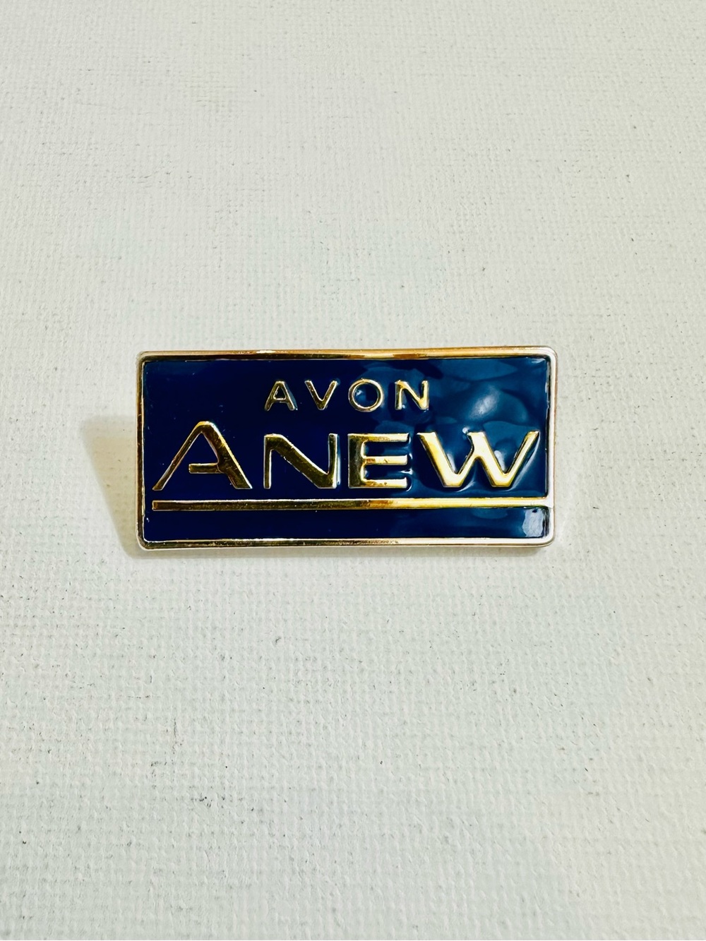Vintage Avon ANEW Blue Enamel Gold Tone Logo Pin Brooch NWOT